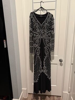 Xscape Black Long-Sleeve Beaded Evening Gown